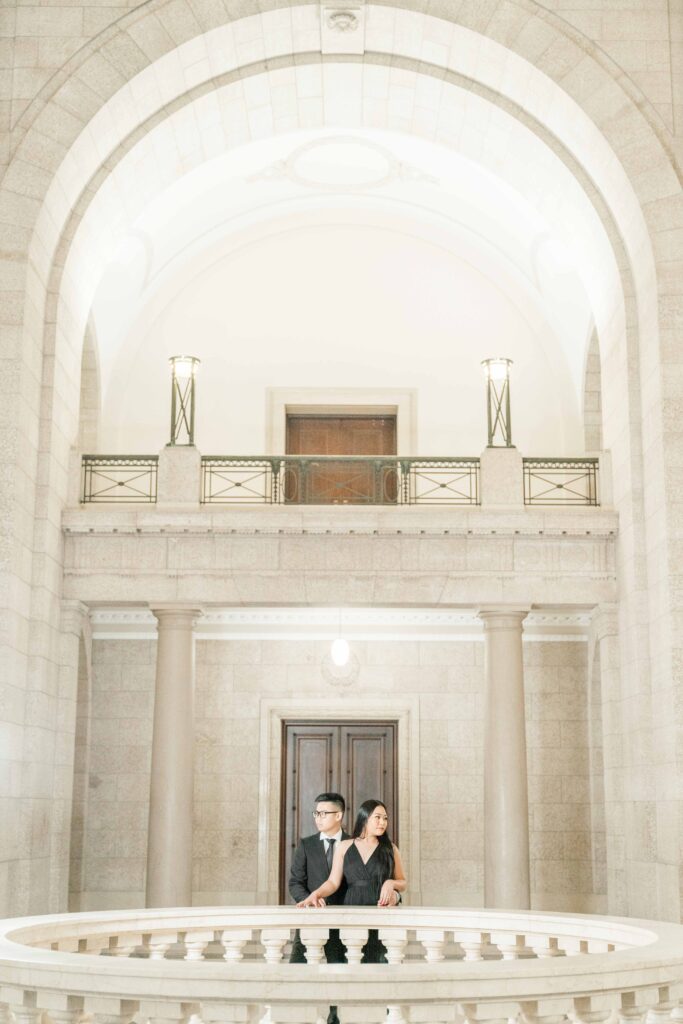 engaged couple doing a photoshoot in the Manitoba legislative building