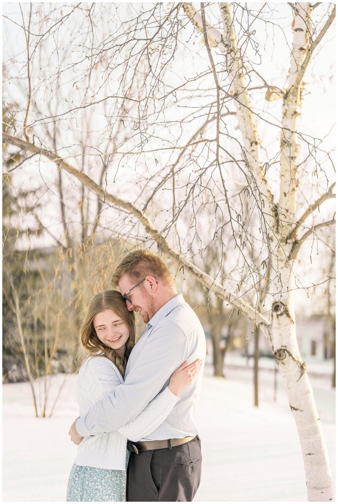 Couple laughing during engagement photos
